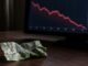 Fitch menține ratingul României la BBB minus dar înăsprește avertismentele